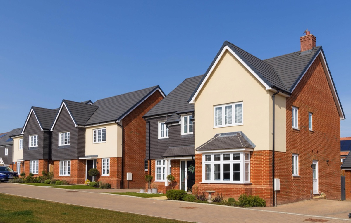A row of newly completed semi-detached houses on a new-build development